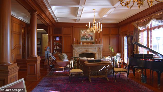 The formal living room has box beam ceilings