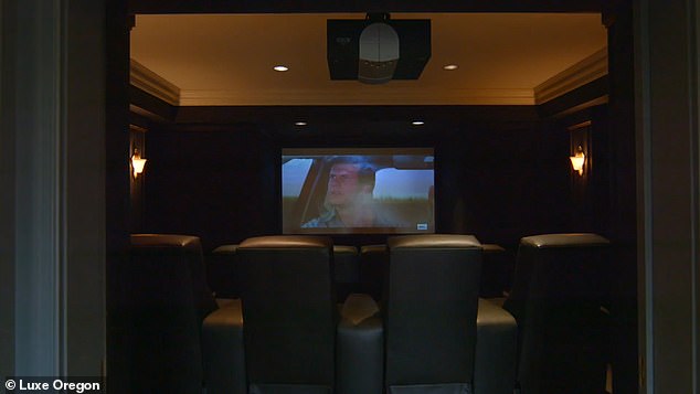 There are eight theater seats in the home theater facing the projector screen