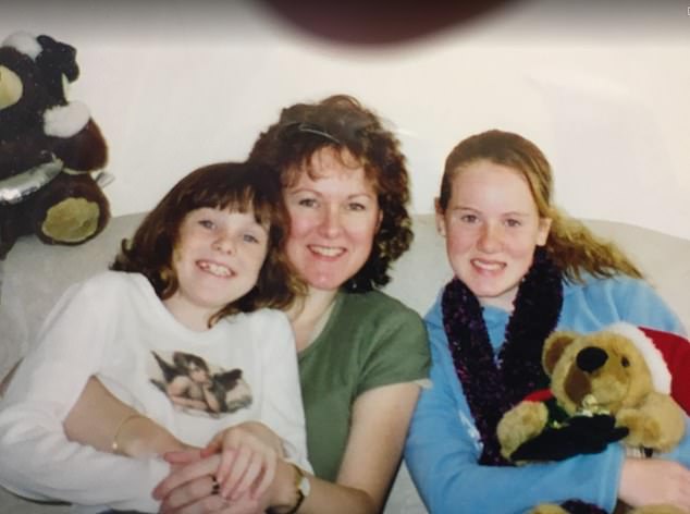 Mrs Holyoak, pictured above with her two daughters, Haley (left) and Michelle, is estranged from her family and lives alone in social housing.