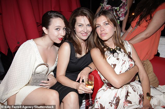 Murdoch is engaged to retired scientist Elena Zhukova (center)