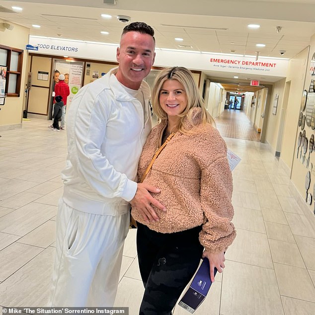 Other photos appeared to have been taken before birth, possibly during check-in at the hospital.  The Situation placed a loving hand on his wife's belly in the lobby