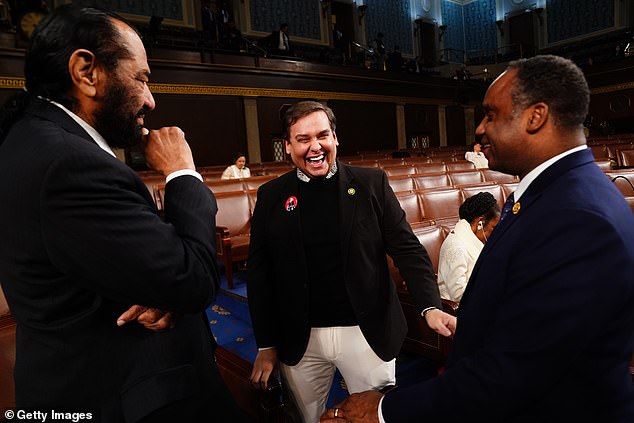 The ousted GOP member even overtook Democrats: Rep.  Al Green, D-Texas, left, and Rep.  Joe Neguse, D-Colo., right