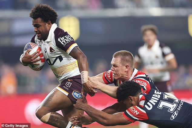 Mundine told mum (pictured at the Vegas Roosters match) to 'toughen up' and 'take it on the chin' after he addressed the abuse last Sunday