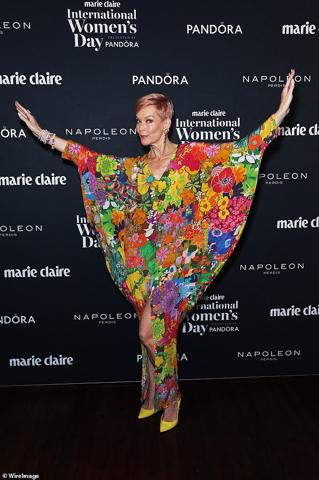 Jessica Rowe provided a colorful ensemble in a floral dress with a high slit and sleeves