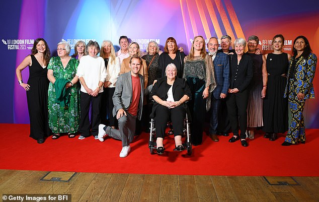 Members of the 1971 England women's football team at the premiere, including Jill Stockley, Val Cheshire, Janice Barton, Yvonne Farr, Marlene Collins, Paula Raynor, Trudy McCaffrey, Louise Cross and 1971 manager Harry Batt's son Kieth Batt posing with producer Victoria Gregory, director Rachel Ramsay and director James Erskine