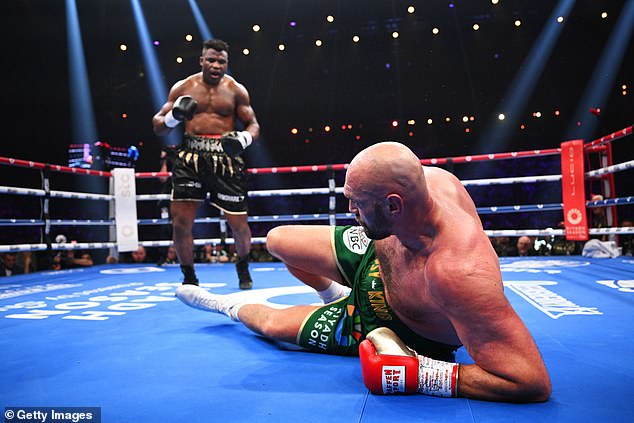 Ngannou comes into this fight coming off a defeat to Fury (right), despite knocking the WBC heavyweight champion to the ground in the third round of that encounter