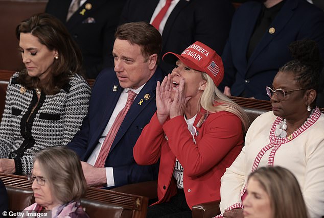 Rep. Marjorie Taylor Greene, R-Ga., shouted several times during Biden's speech