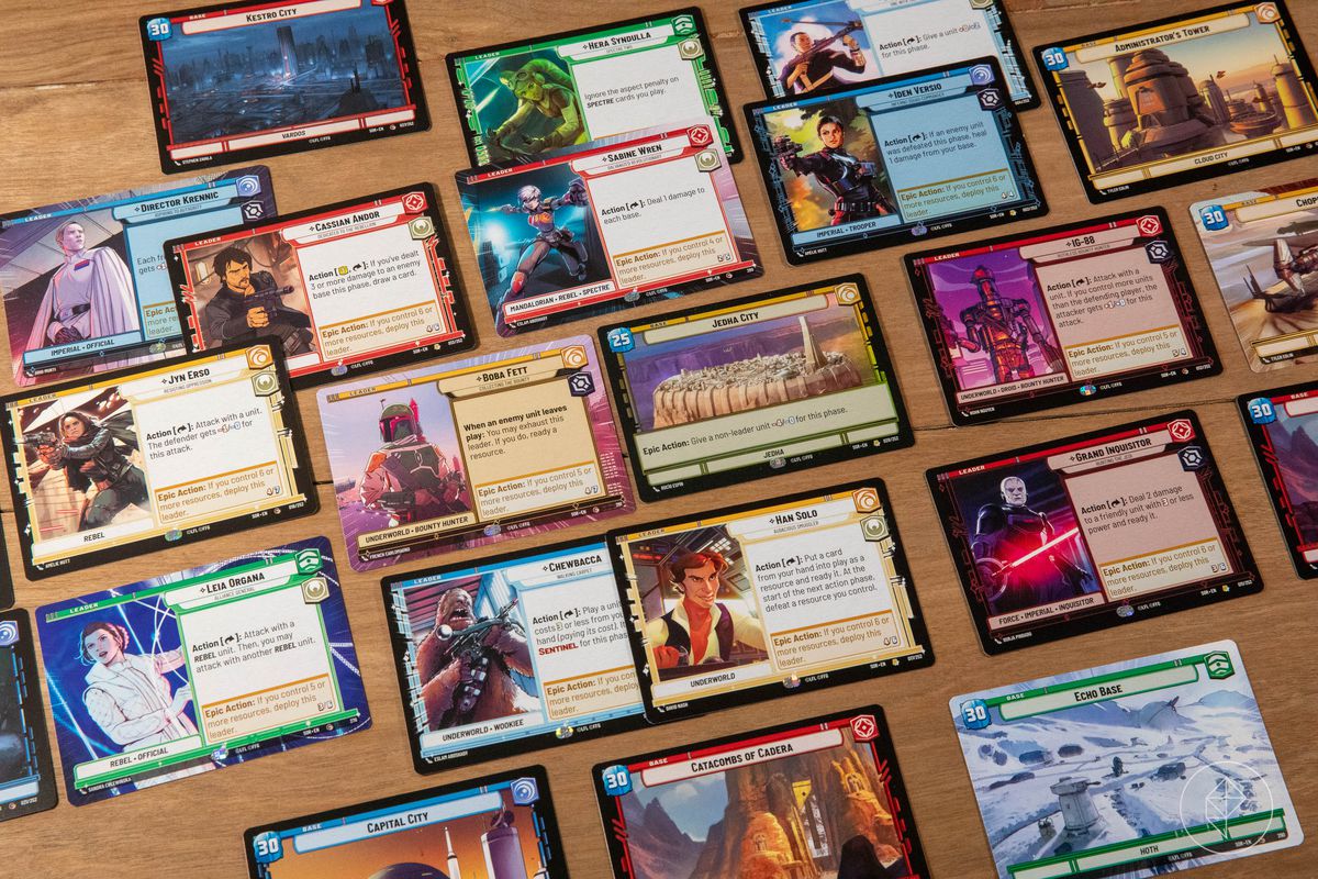 An assortment of cards including Jyn Erso, Iden Versio, Grand Inquisitor and Boba Fet.  In the center is Jedha City, a stunt base with less health than the rest.