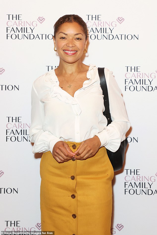 Antonia Thomas added a pop of color to the event as she stepped out in a retro yellow leather skirt