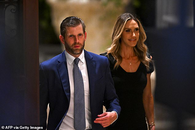 Eric Trump (L), son of former US President and 2024 presidential candidate Donald Trump, and his wife Lara Trump attend a Super Tuesday election night watch party at Mar-a-Lago Club in Palm Beach, Florida