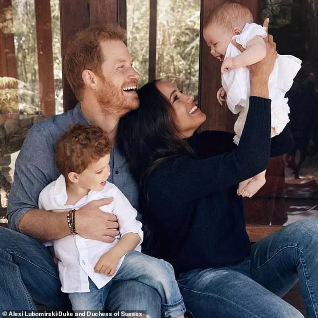 Prince Harry and Meghan are seen with their young children Archie and Lilibet