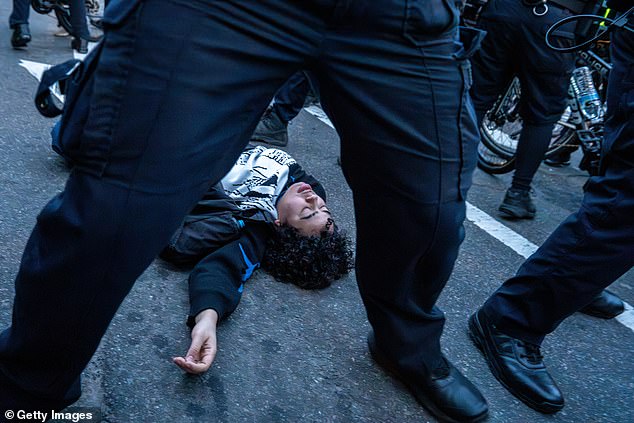 Disturbing video shows a pro-Palestinian protester being beaten unconscious on the streets of New York as demonstrators rampage through the city