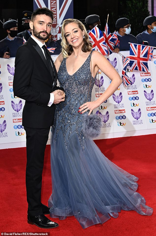 The Wanted singer Tom Parker (pictured with his wife Kelsey Parker in October 2021) died in March 2022 after an 18-month battle with stage four glioblastoma.  He said after his diagnosis that he was 'shocked' by the limited treatment options for GBM and that 'massive improvements' were needed