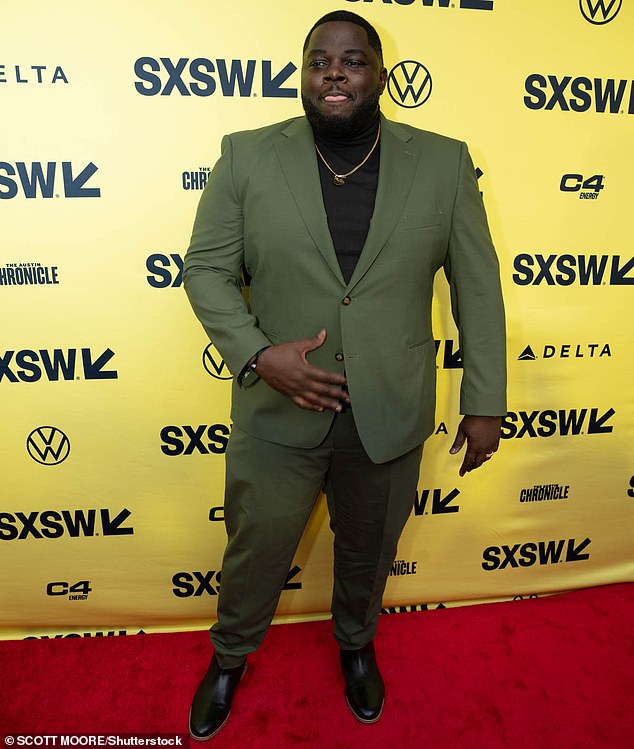 Catfish Jean kept it classy in an olive green jacket and matching trousers at the Road House premiere