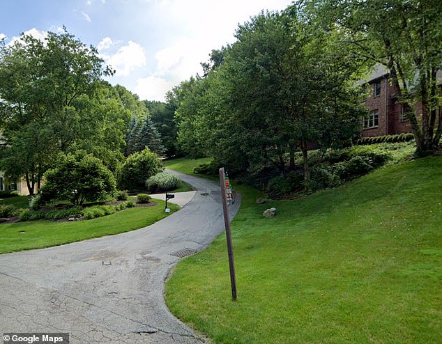 Police say Rosenberg invited Moore-Rouse to his home, then shot his friend in the back of the head, dragged his body across the driveway and hid it from the road.  In the photo: a road leading to the Rosenberg House