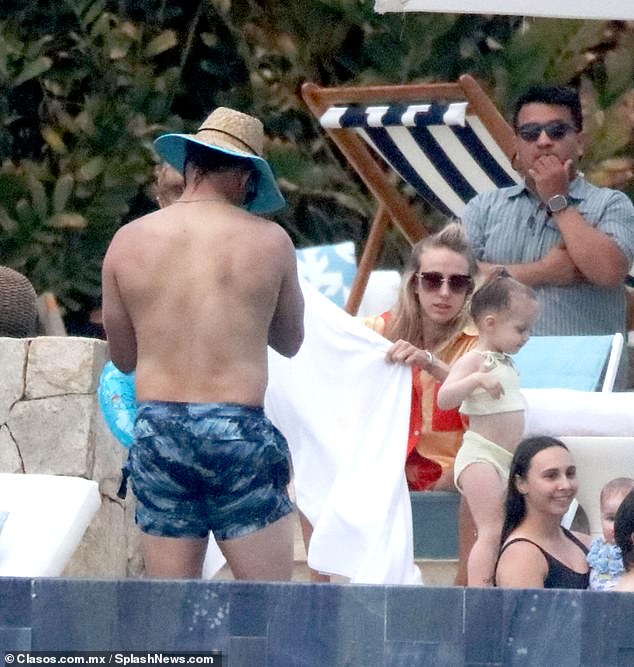 During the trip, Brittany was seen wrapping a towel around Sterling at the pool