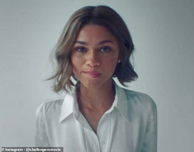 In a close-up, Zendaya debuted a blunt bob and seductively bit her lip while wearing a pretty white shirt