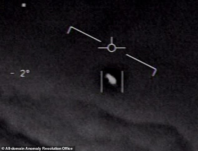 This UFO, also captured by the US Navy, can only be described as a 'milk bottle' or a bowling pin