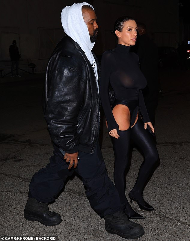 A thong strap allowed Bianca to stay within the law as she strutted her pert rear end in front of Kanye