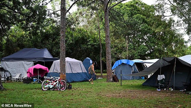 The state government announced it planned to build a further 53,500 social homes by 2046 (photo tents set up in Mckillop Park)