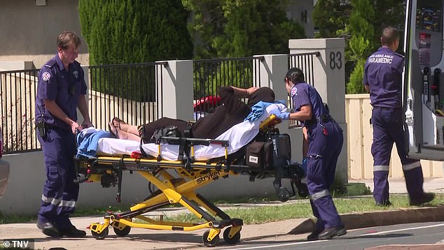 A second man, aged 47, was treated for head injuries and taken to Auburn Hospital where he is assisting police with their investigation.  The photo shows a man on a stretcher