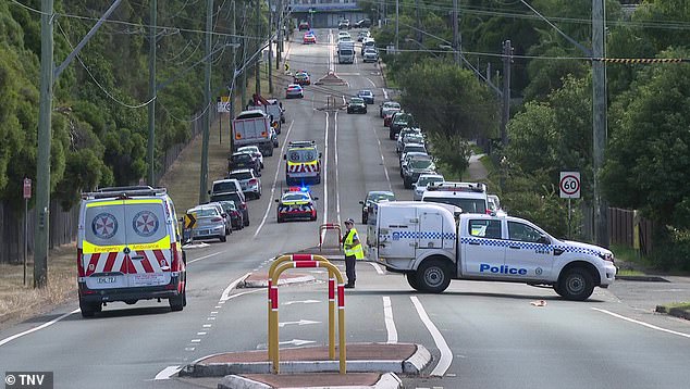 A man, 46, was treated at the scene by paramedics before being taken to Westmead Hospital with a police escort (pictured)