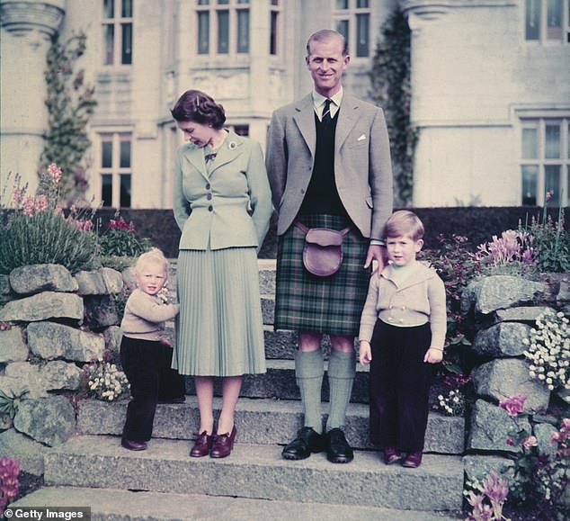 Queen Elizabeth II looks down on Princess Anne outside Balmoral with her husband, the Duke of Edinburgh, Prince Philip and Prince Charles