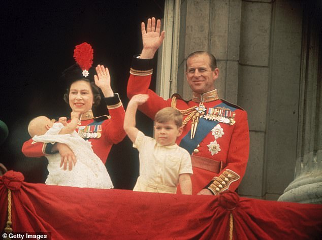 Queen Elizabeth, Prince Philip, Prince Andrew and Prince Edward wave to the crowd from the balcony of Buckingham Palace, during the Trooping of the Color in 1964