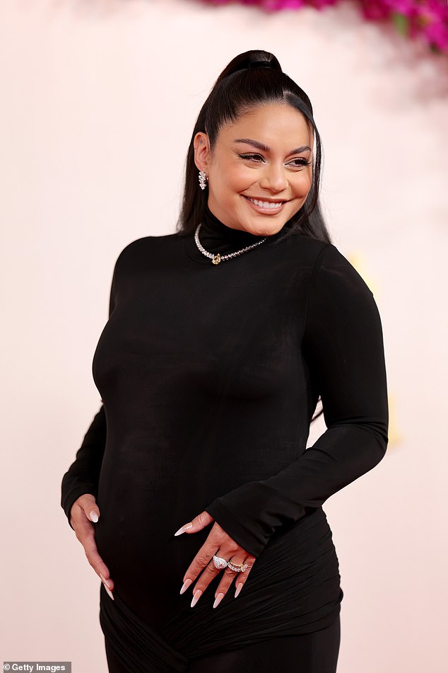 The star, who is married to Cole Tucker, showed off her pregnant belly in a figure-hugging black dress