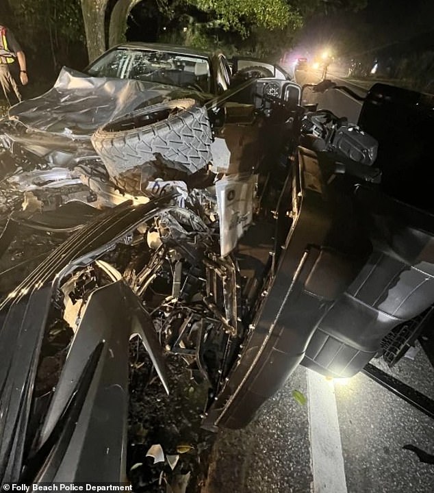 The couple's mangled golf cart is pictured after the crash.  The cart rolled several times and was thrown 100 yards by Komoroski's Toyota Camry