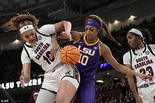 Kamilla Cardoso (left), the 6-foot-1 center from South Carolina, brawls with LSU's Angel Reese (right)