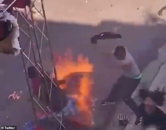 A man used a shirt to put out the flames while a carnival participant's costume was on fire