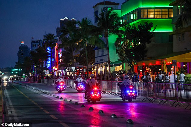 Quiet streets and a strong law enforcement presence are seen during this year's Spring Break on Ocean Avenue in Miami Beach, Florida, on March 10, 2024