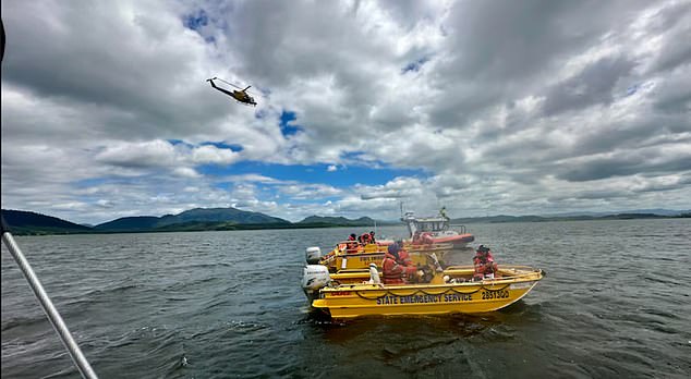 Pictured: Rescue boats search for Craig after he went missing on Saturday at Kinchant Dam, about 35km west of the Queensland town of Mackay