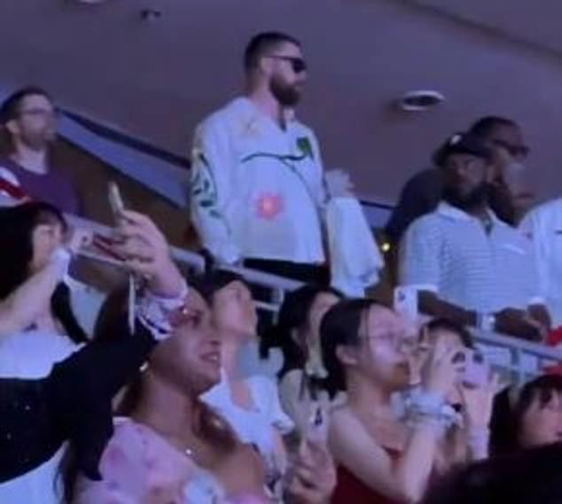 Kelce is seen watching Swift's show in Singapore last week - he was there for two nights