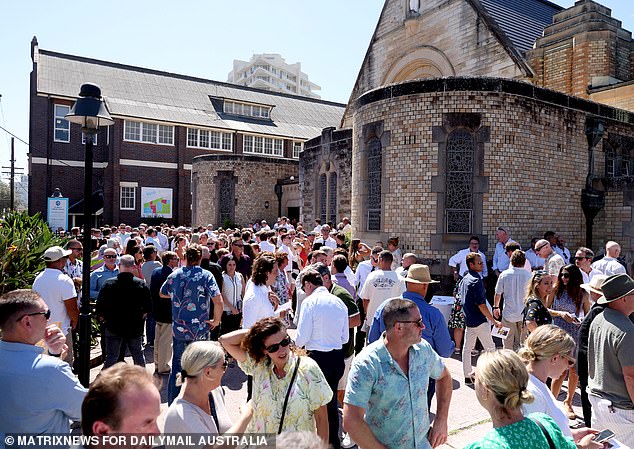 The line to sign a book of condolence for Aaron Nable stretched to a nearby road