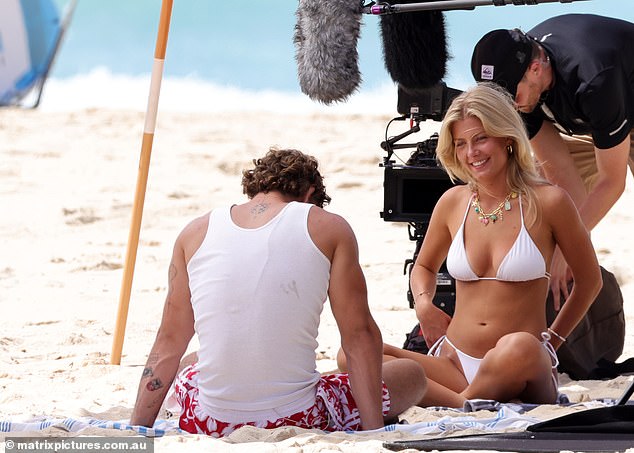 A camera crew followed her every move on the pristine Bondi sands