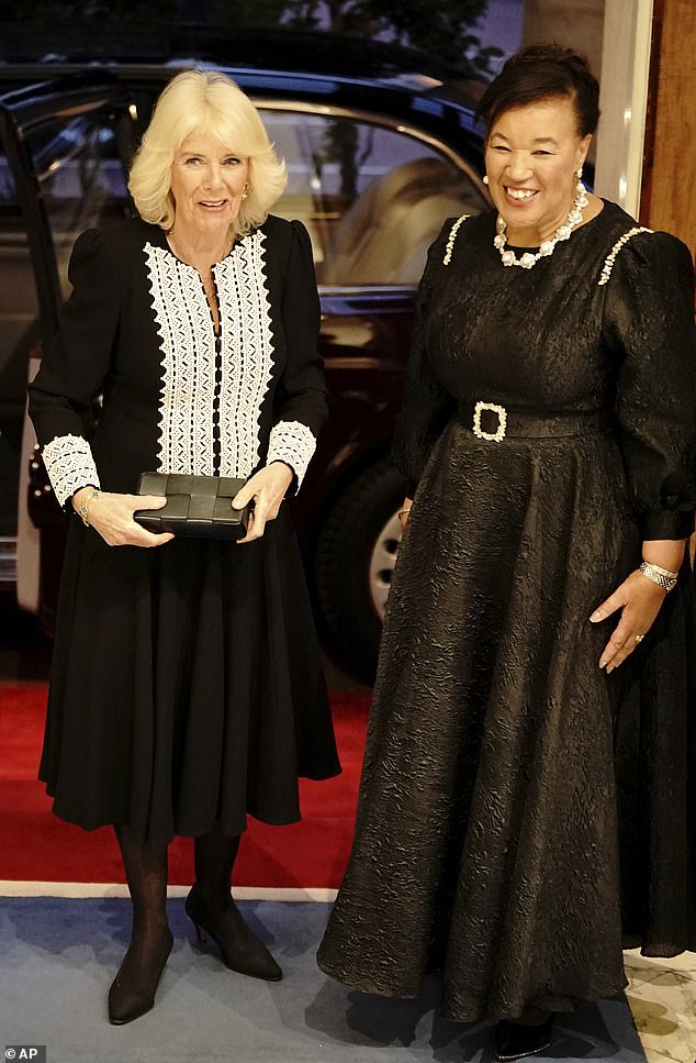 Baroness Scotland van Asthal also opted for a black evening dress with jacquard effect and a glitter belt at the waist