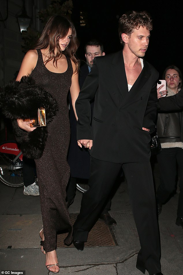 Kaia and boyfriend Austin were spotted heading to a Dune Part Two afterparty in London last month;  pictured on February 15 in London on the way to the after party