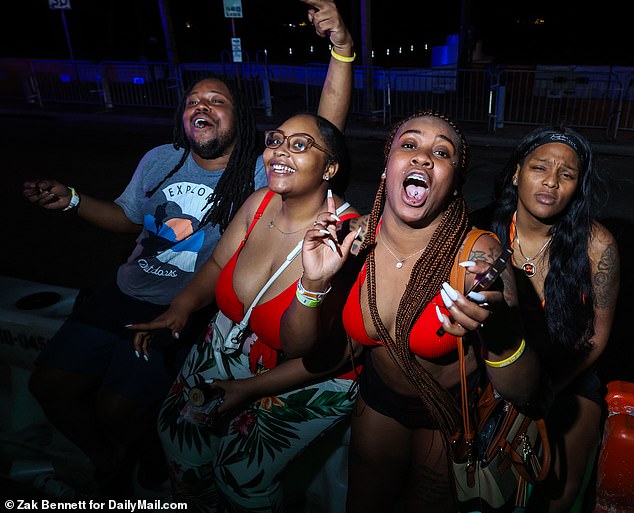 Despite it being dark, the spring breakers continued to wear their bikini tops well into the night