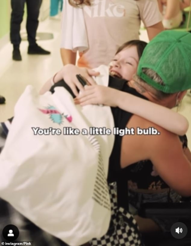 Pink shared a precious video on Instagram on Tuesday capturing the beautiful moment she visited the hospital and sang her hit 'Cover Me In Sunshine' to the children.  Imogen was seen in the heartfelt clip alongside Pink who told the 10-year-old: 'You're like a little light bulb'