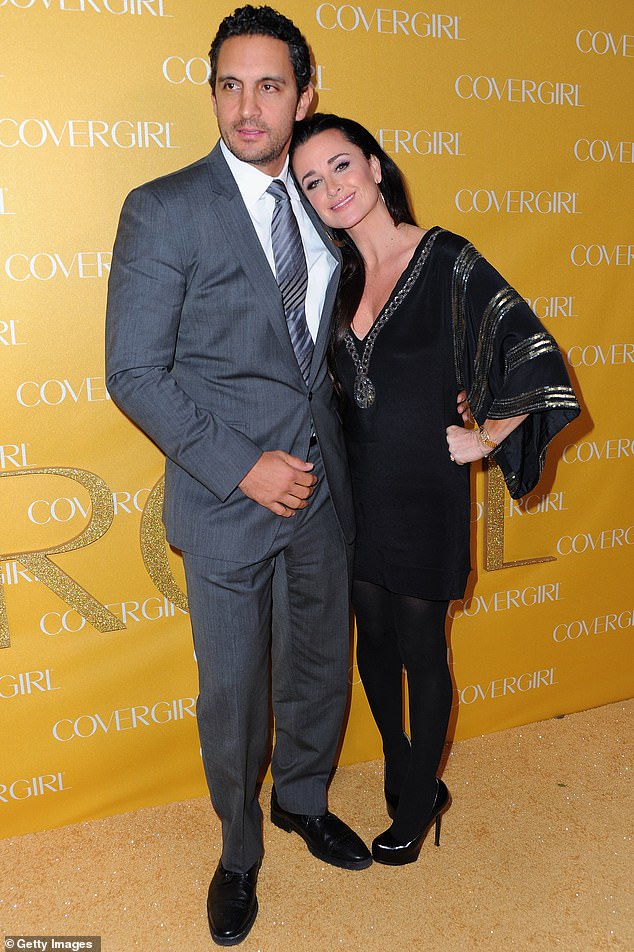 Mauricio is the estranged husband of Real Housewife Of Beverly Hills Kyle Richards, whose sister is Paris' mother, Kathy Hilton;  Mauricio and Kyle are pictured in 2011