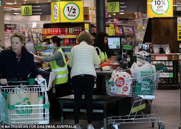 The Association of Superannuation Funds of Australia (ASFA) estimates that a single retiree needs $51,278 a year for his lifestyle, provided he has paid off his house (pictured is a Woolworths supermarket in Sydney's east)