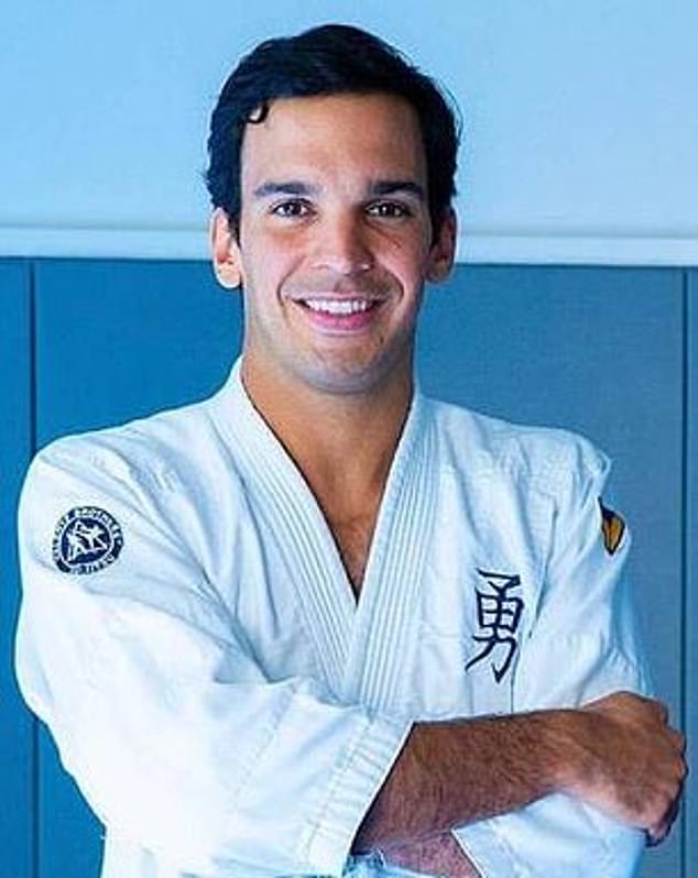 Valente seen in his bathrobe for a workout photo to promote his Miami gym