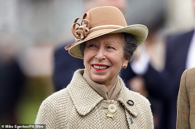 Princess Anne, another racing enthusiast, opted for a tweed coat with a camel hat and a scarf to protect herself from the cold