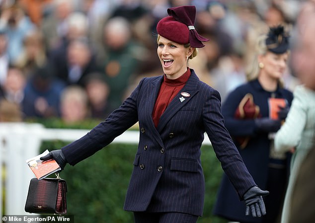 Equestrian Zara, who is known for her love of all things racing, looked animated as she strolled around the racecourse