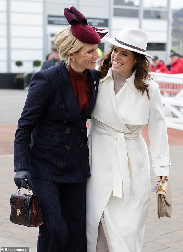 Pictured: The two cousins ​​hugged as they walked into the races at Cheltenham this afternoon