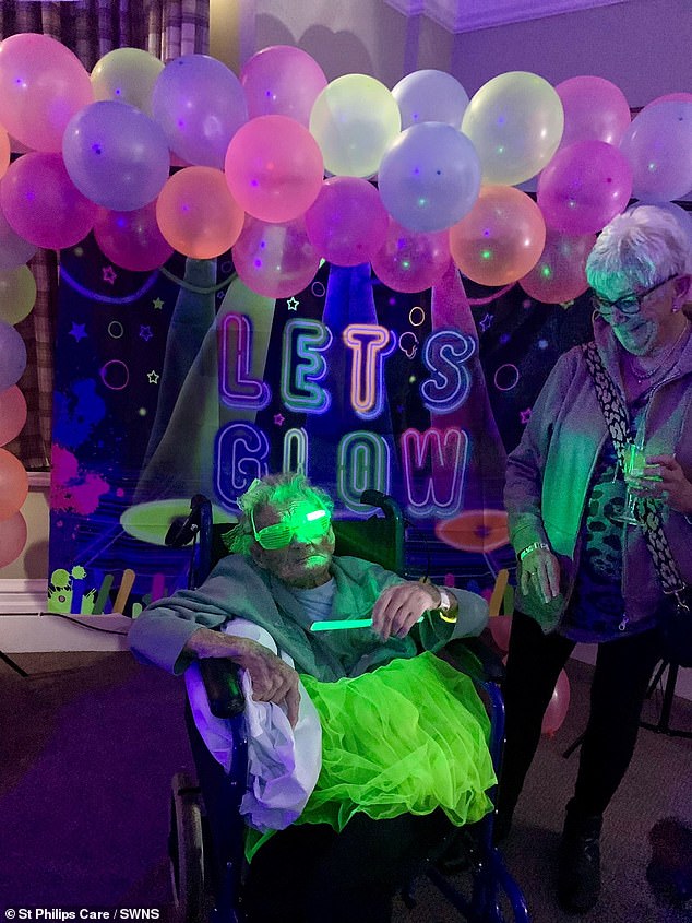 Vera wore glow-in-the-dark neon glasses and a green tutu