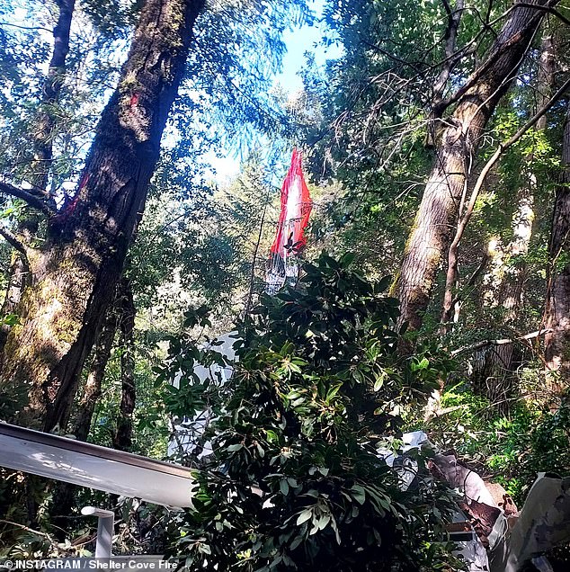 The life-saving parachute was still in the canopy when they arrived on scene