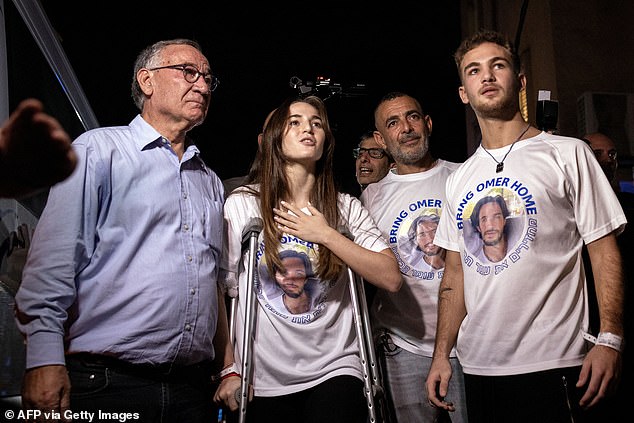 Maya and Itay Regev are pictured arriving at their family home in the city of Herzliya near Tel Aviv on December 4, 2023, after their release from captivity by Hamas in the Gaza Strip